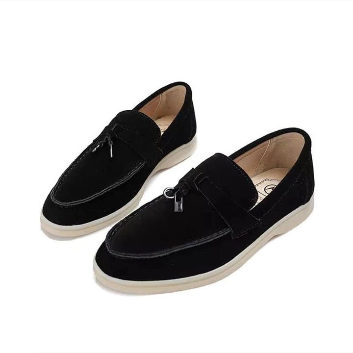 Women's black and grey loafers with pointed toe and cream contrast sole