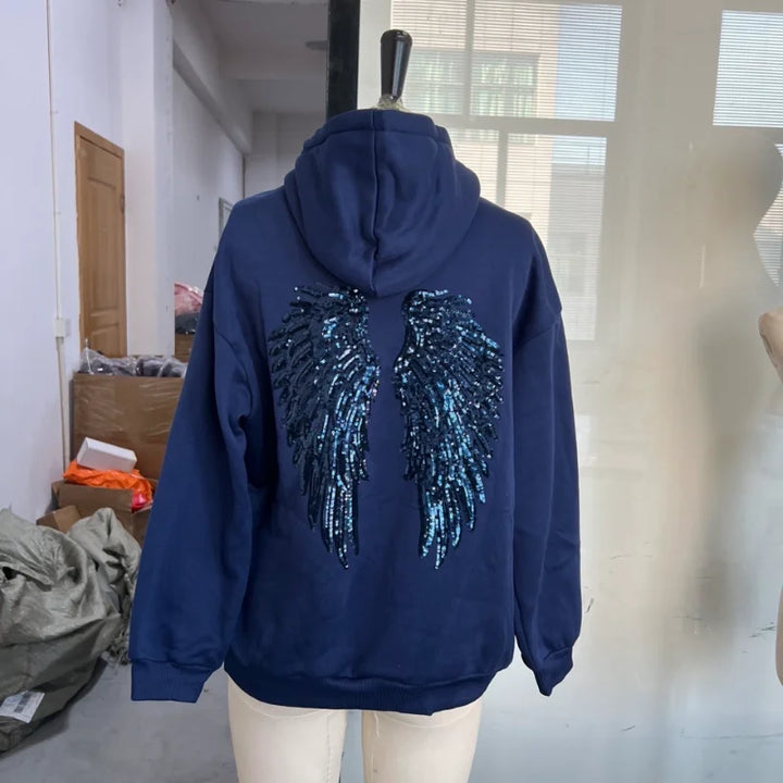 Women's hooded sweatshirt with sequin wing detailing on the back