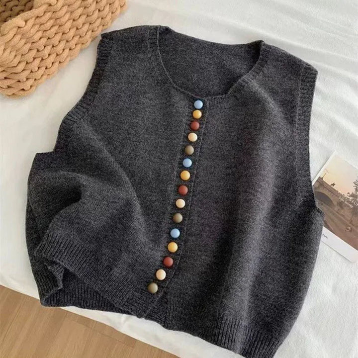 Sleeveless knit vest with round neckline and multicoloured button front