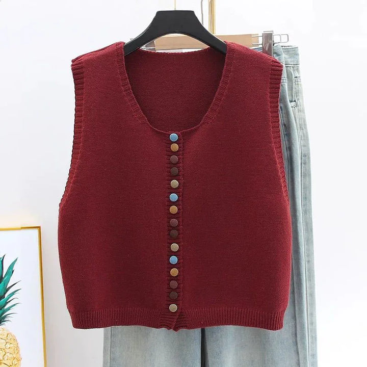 Sleeveless knit vest with round neckline and multicoloured button front