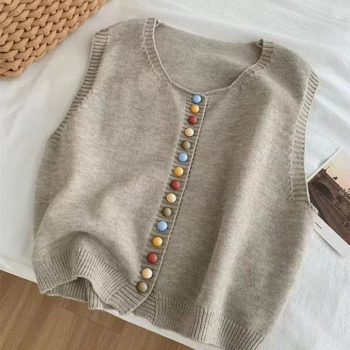 Sleeveless knit vest with round neckline and multicoloured button front