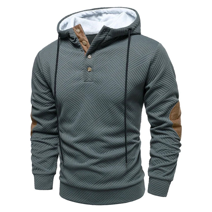 Men's textured geometric hoodie with drawstring hood and contrasting elbow panels