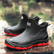 Women's waterproof ankle rain boots in slip-on style with textured tread sole and reinforced toe cap