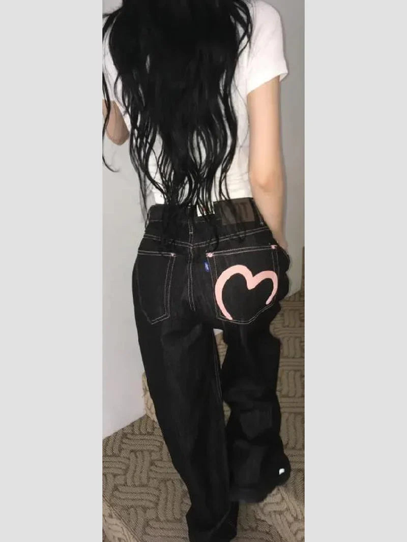 Women's gray wide leg jeans with heart back pocket detail