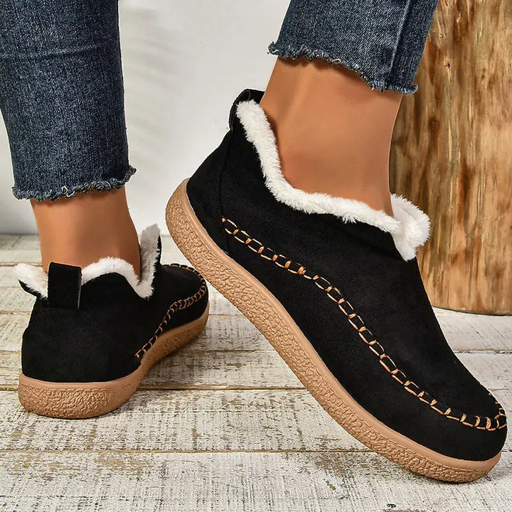 Women's fur-trimmed slip-on ankle boots with round toes and flat textured soles