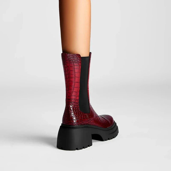 Women's pull-on ankle boots with textured upper and black lug sole