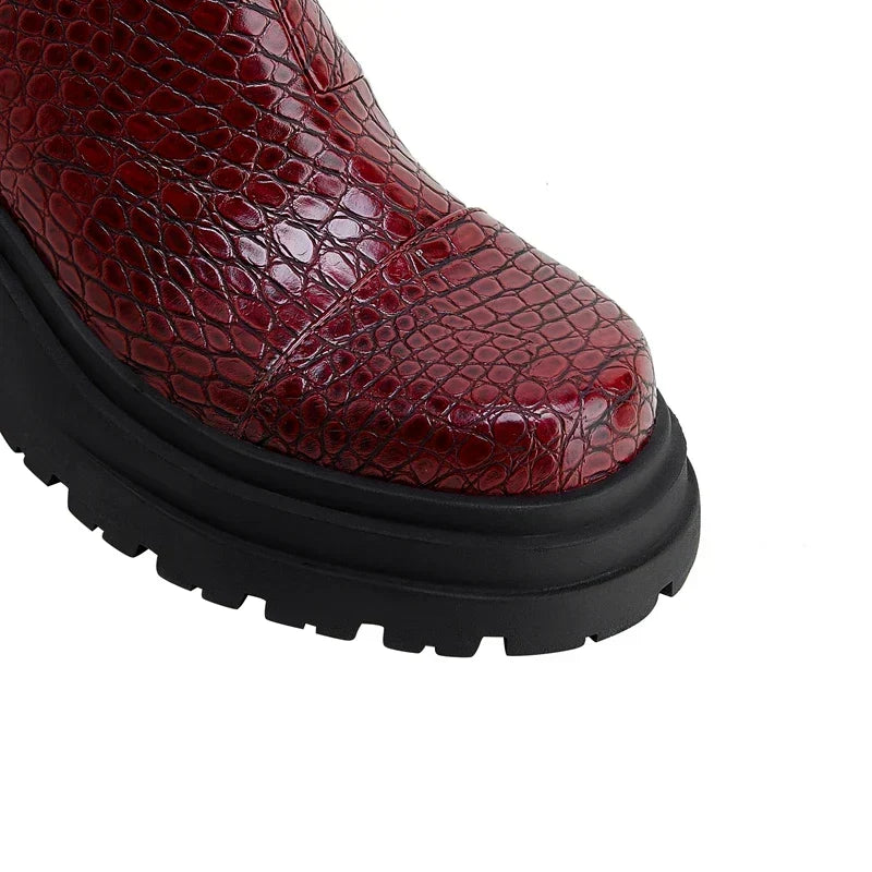 Women's pull-on ankle boots with textured upper and black lug sole