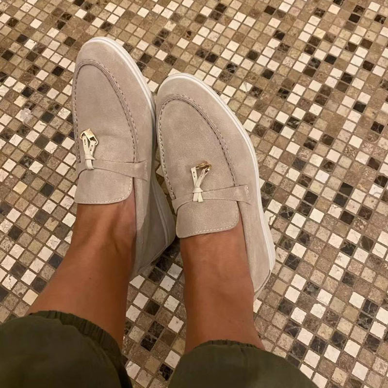 Women's black and grey loafers with pointed toe and cream contrast sole