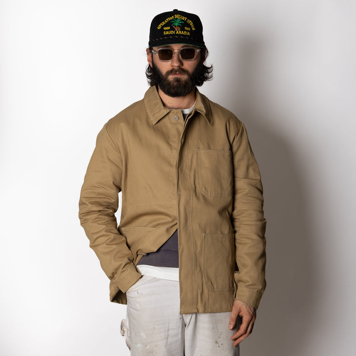 Men's brown utility jacket with four patch pockets