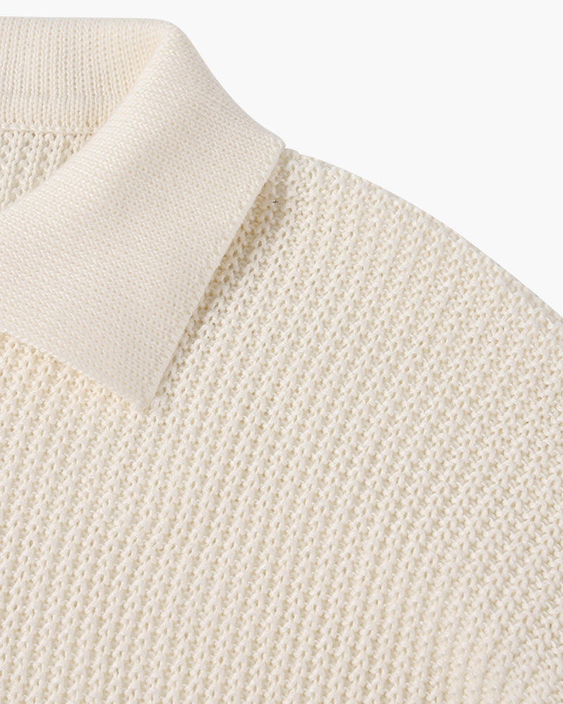 Men's ribbed quarter-zip polo sweater with long sleeves and collared neckline