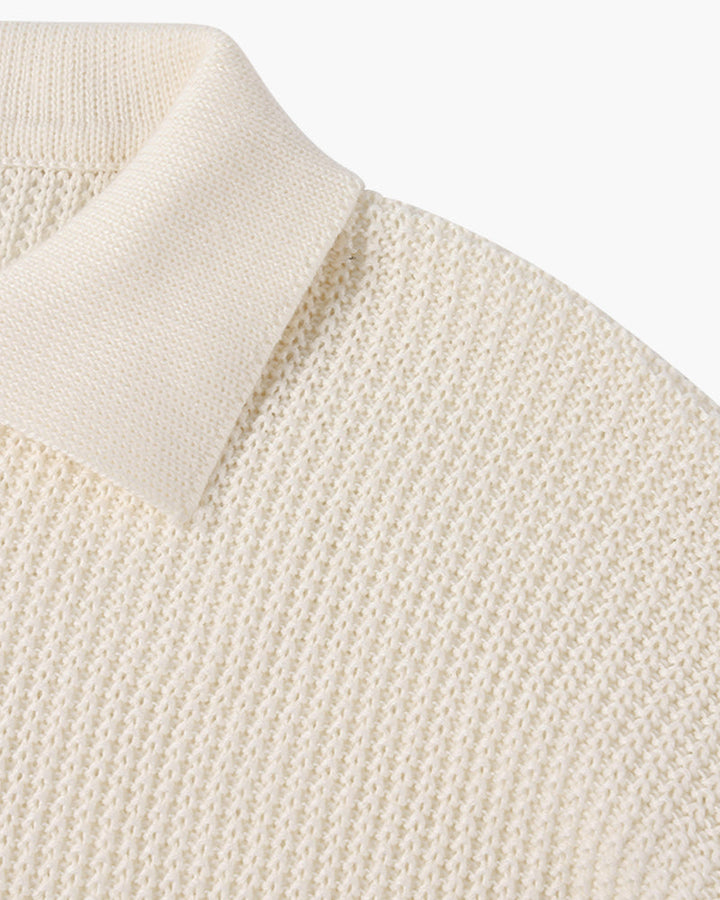 Men's ribbed quarter-zip polo sweater with long sleeves and collared neckline