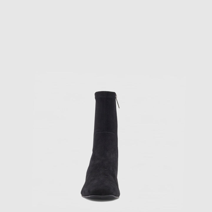 Women's black ankle boot with almond toe and mid block heel