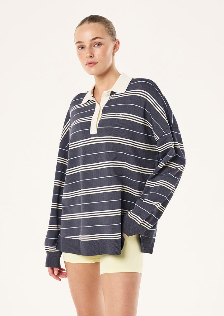 Women's striped rugby knit jumper with polo collar and long sleeves