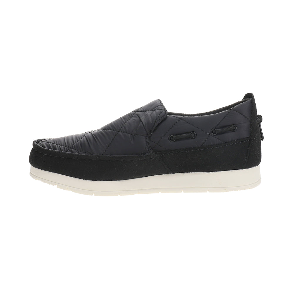 Black quilted moc slippers with round toe and contrasting flat sole