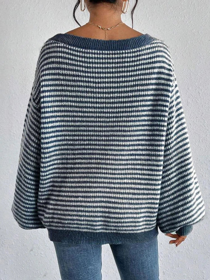 Women's striped knit sweater with boat neckline and long sleeves