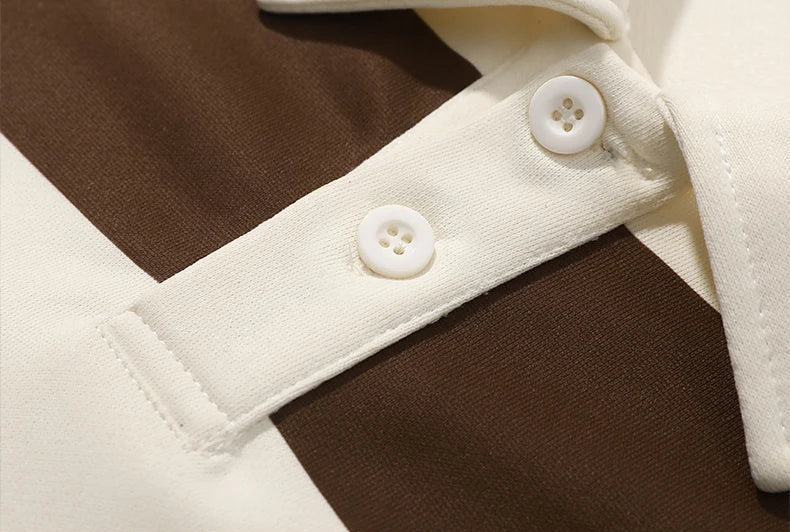 Unisex striped polo jumper with long sleeves, button placket and ribbed trims