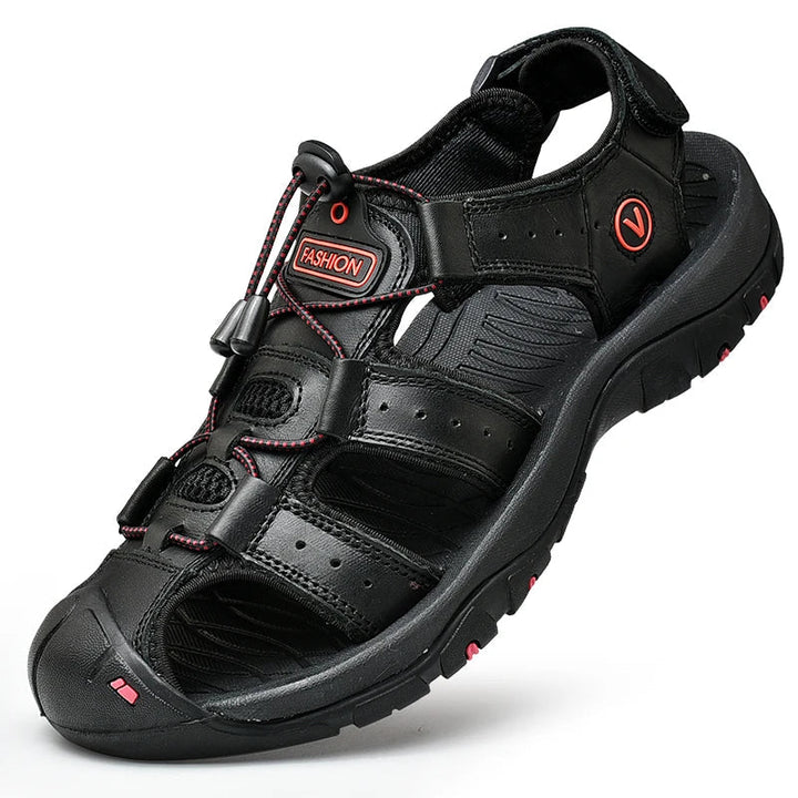Men's closed-toe hiking sandal with adjustable velcro straps and cushioned midsole, shown in brown and navy colorways