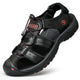 Men's closed-toe hiking sandal with adjustable velcro straps and cushioned midsole, shown in brown and navy colorways