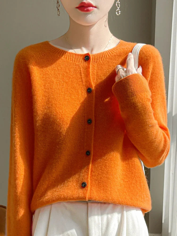 Women's knitted button-front cardigan with round neck and long sleeves