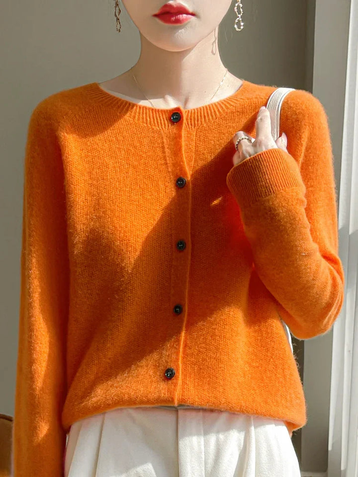 Women's knitted button-front cardigan with round neck and long sleeves