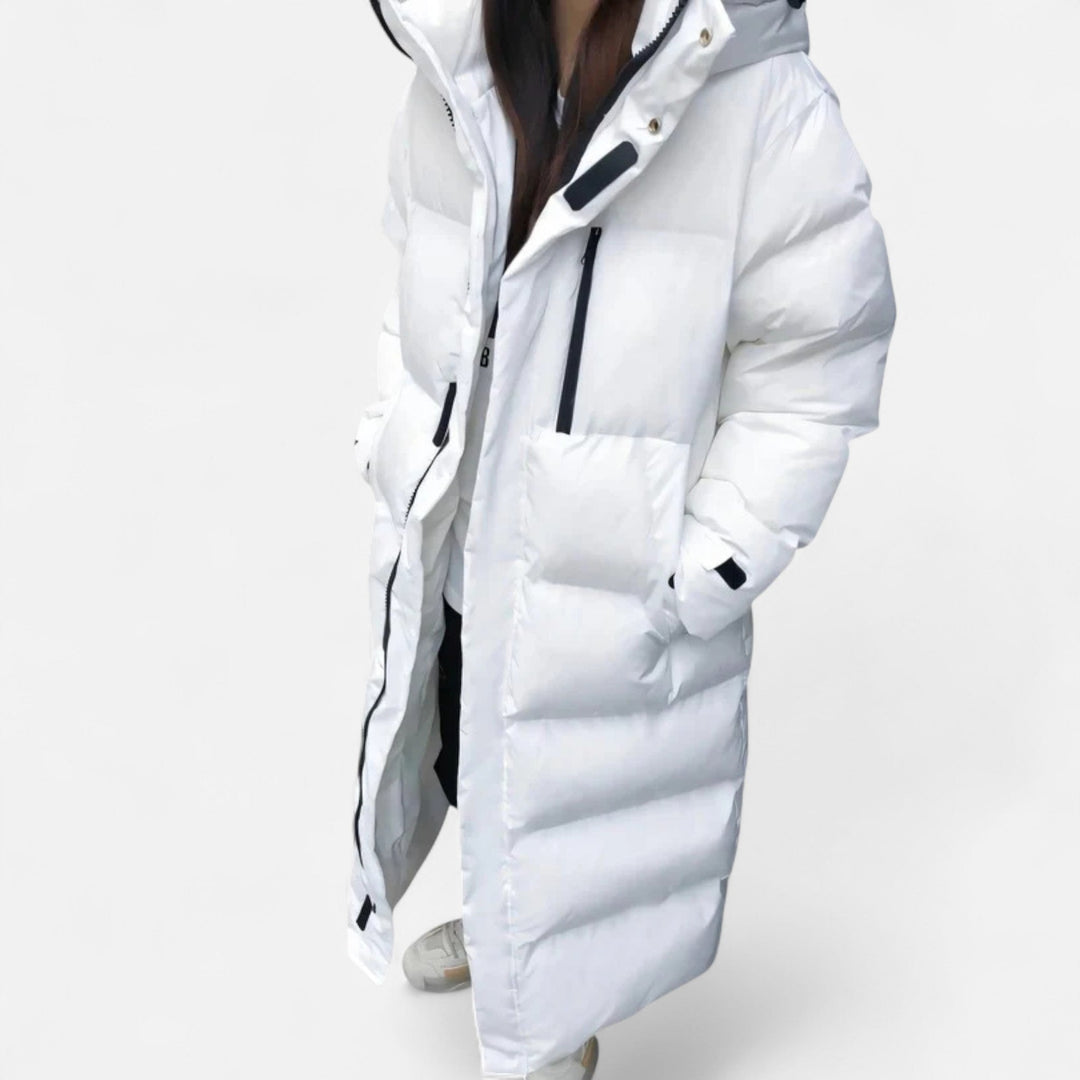 Women's long quilted hooded puffer coat with zip front and pockets