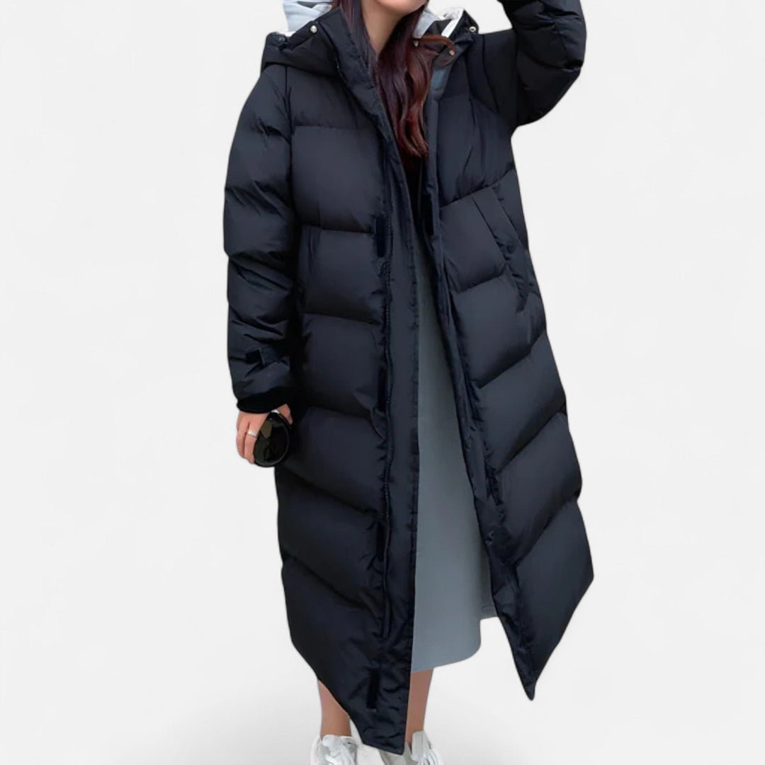 Women's long quilted hooded puffer coat with zip front and pockets