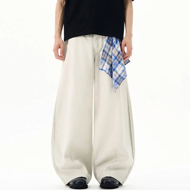 Cream wide leg trousers with elastic waistband and checked waist tie