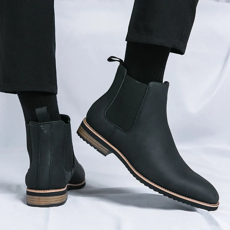 Unisex Chelsea ankle boots with elastic side panels and pull tabs