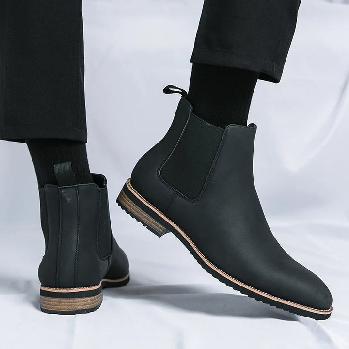 Unisex Chelsea ankle boots with elastic side panels and pull tabs