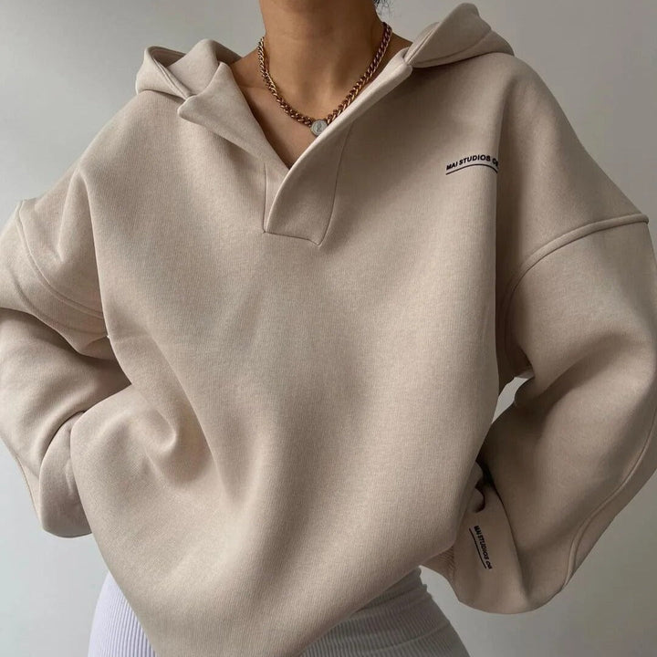 Women's hooded pullover with split V-neck and ribbed cuffs