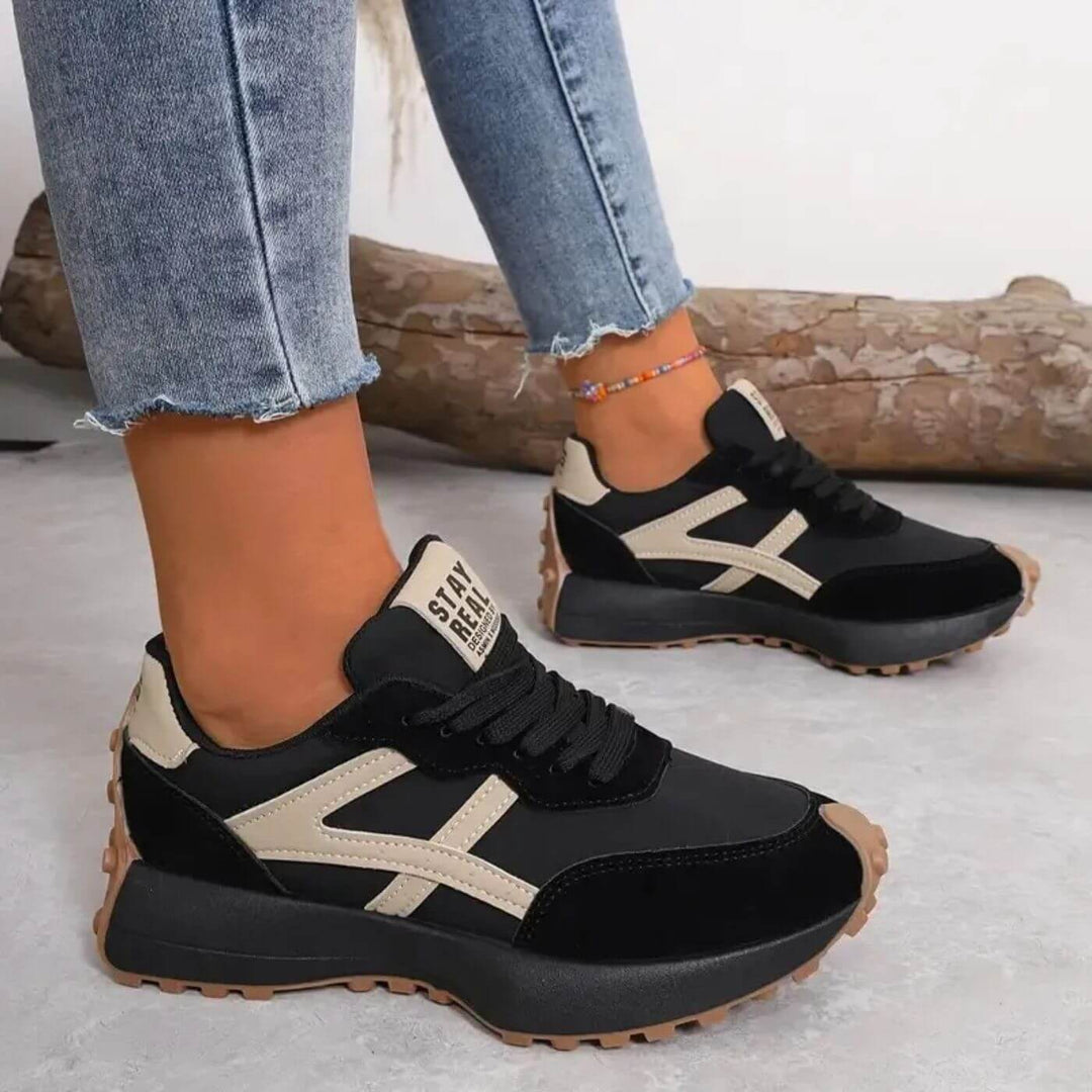 Women's black and beige geometric lace-up sneakers with textured soles