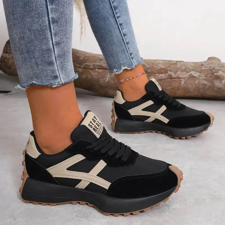 Women's black and beige geometric lace-up sneakers with textured soles