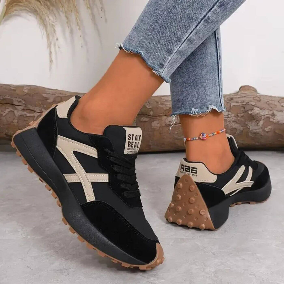Women's black and beige geometric lace-up sneakers with textured soles