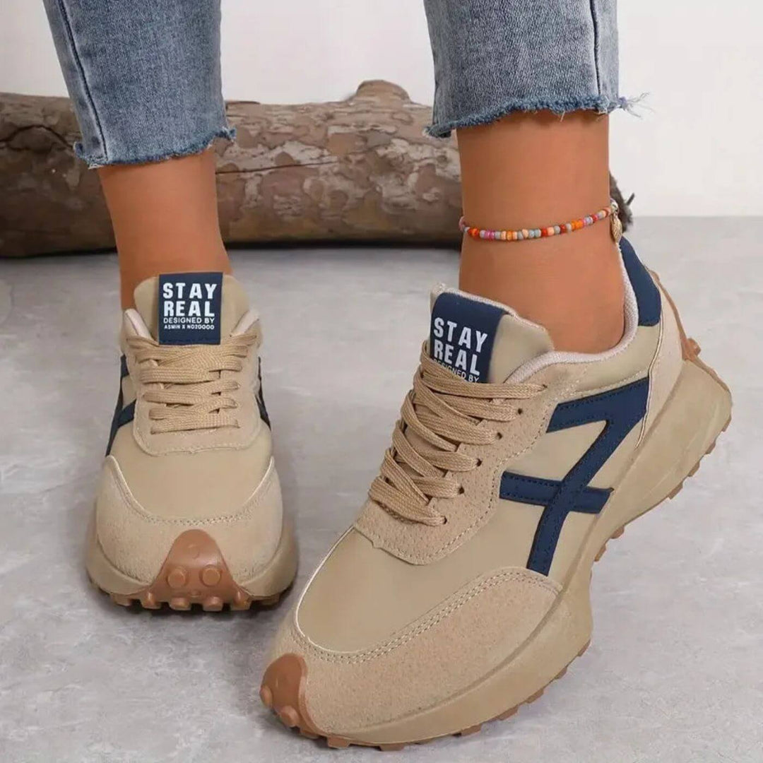 Women's black and beige geometric lace-up sneakers with textured soles