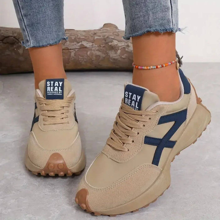 Women's black and beige geometric lace-up sneakers with textured soles