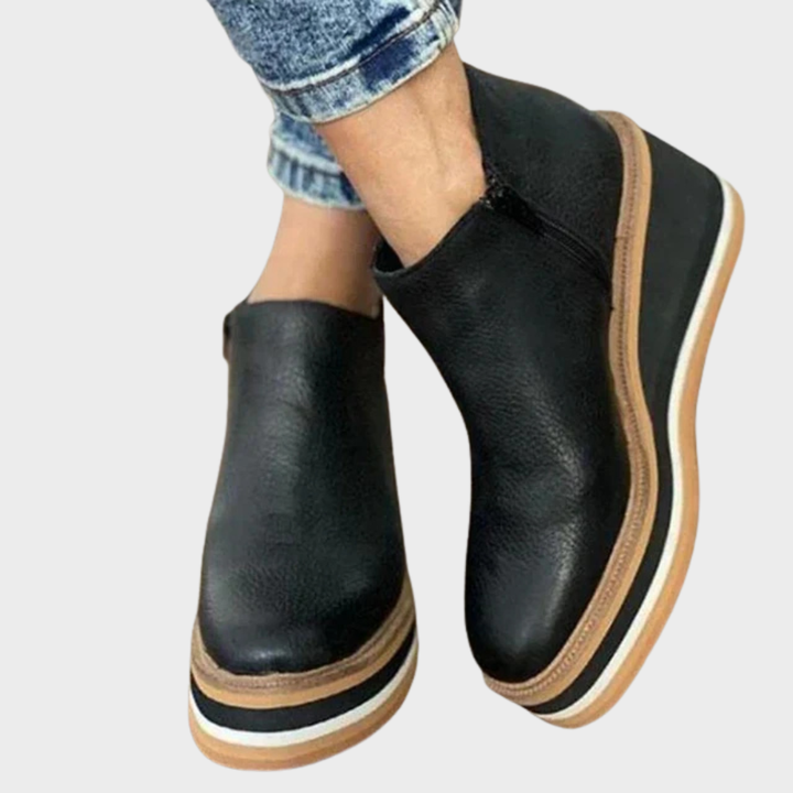 Women's slip-on ankle boots with round toes and layered flat soles