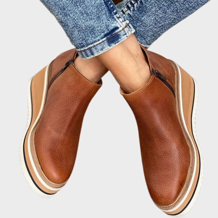 Women's slip-on ankle boots with round toes and layered flat soles