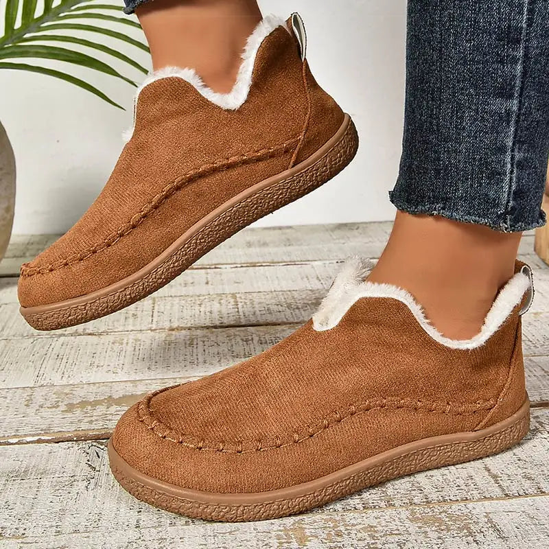 Women's fur-trimmed slip-on ankle boots with round toes and flat textured soles