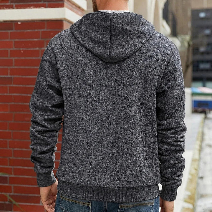 Men's hooded zip jacket with fleece-style lining and zipped pockets