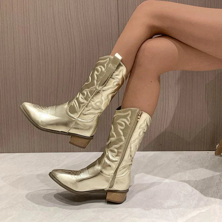 Women's metallic cowboy boots with pointed toes and embroidered shaft detail