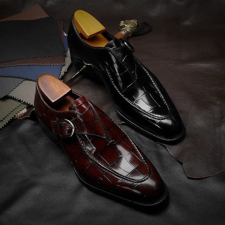 Men's glossy crocodile-effect loafers with buckle straps and low heels