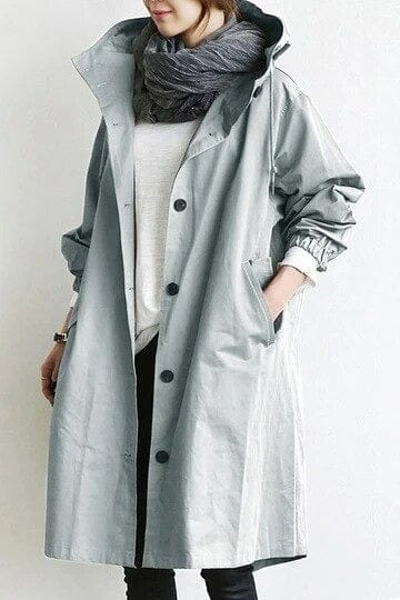 Women's hooded trench coat with button front and side pockets