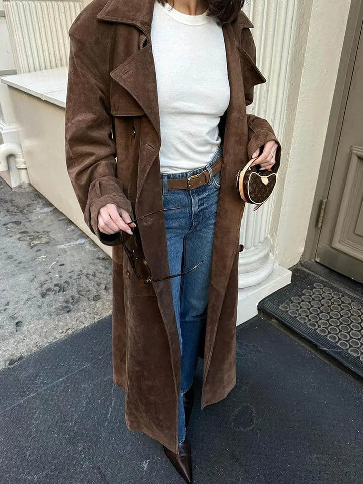 Women's brown full-length trench coat with contrast lapels and waist belt
