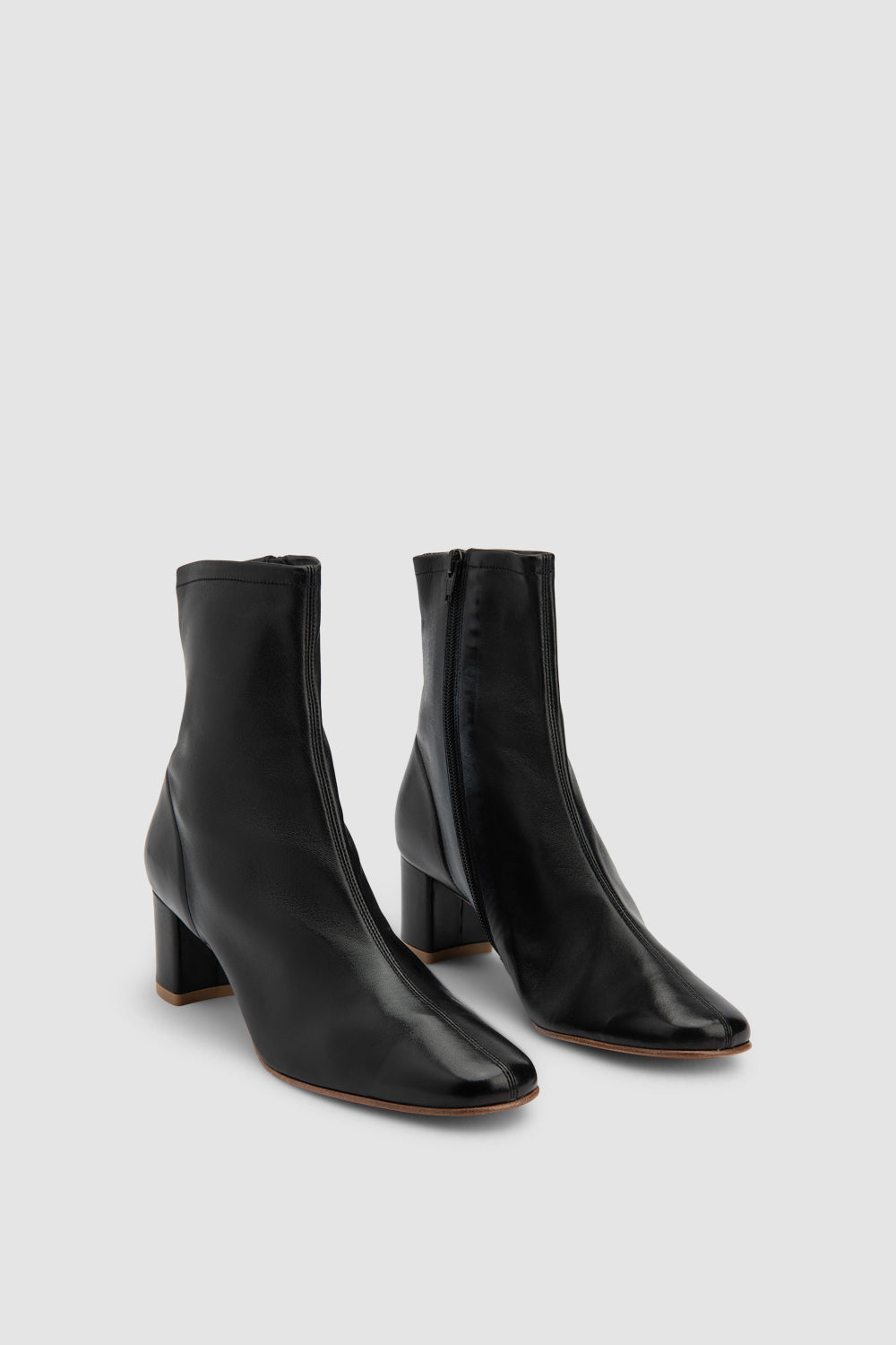 Black women's ankle boots with rounded toe and mid block heel
