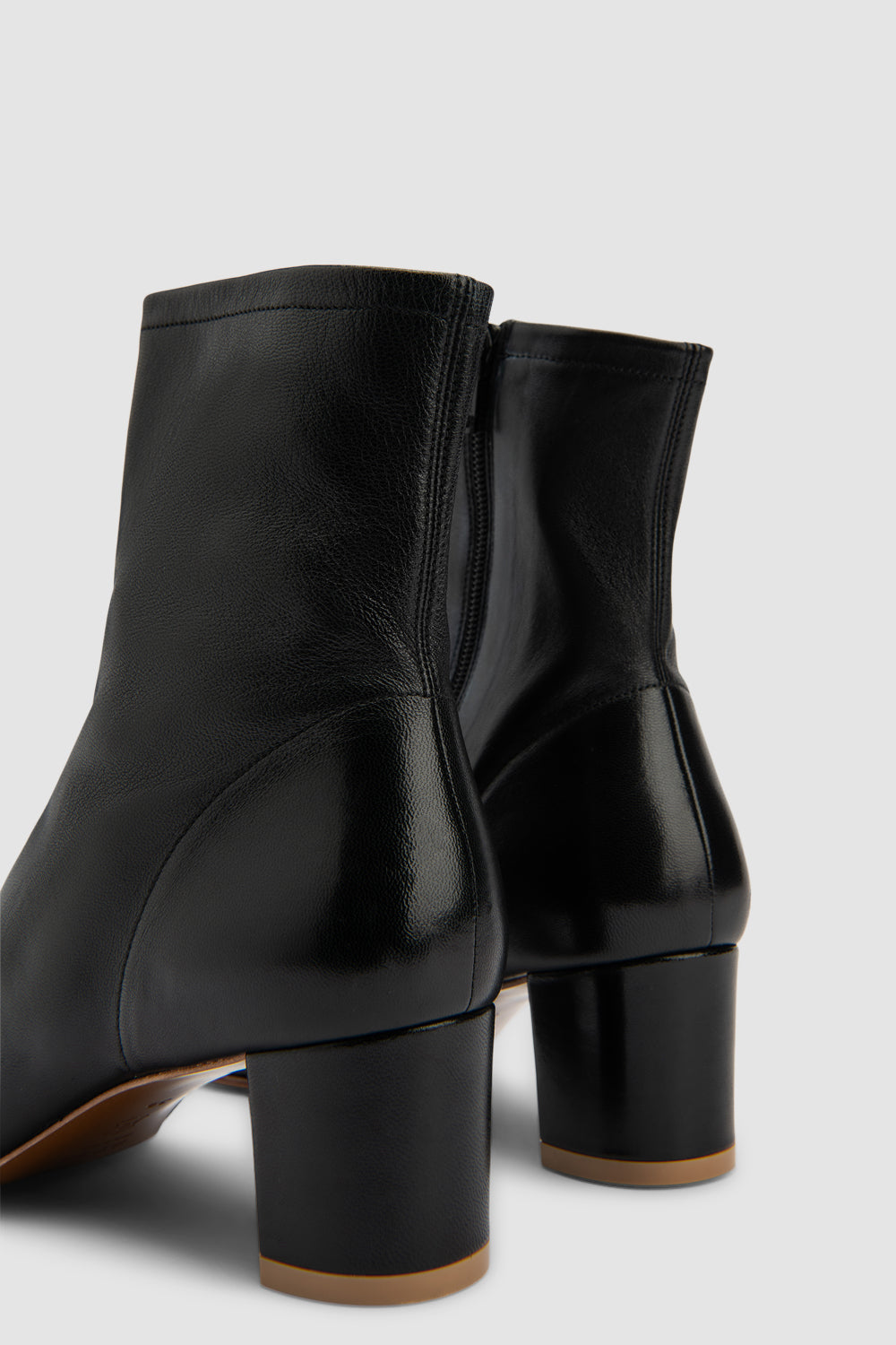 Black women's ankle boots with rounded toe and mid block heel
