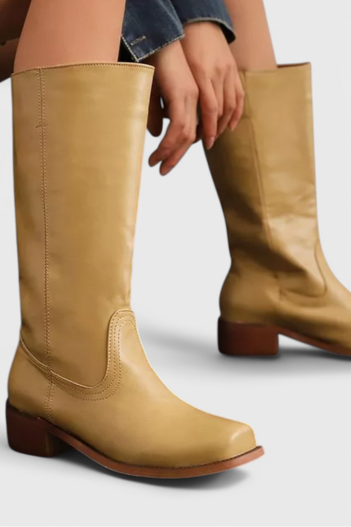 Women's knee-high slip-on boots with block heel, shown in brown and black