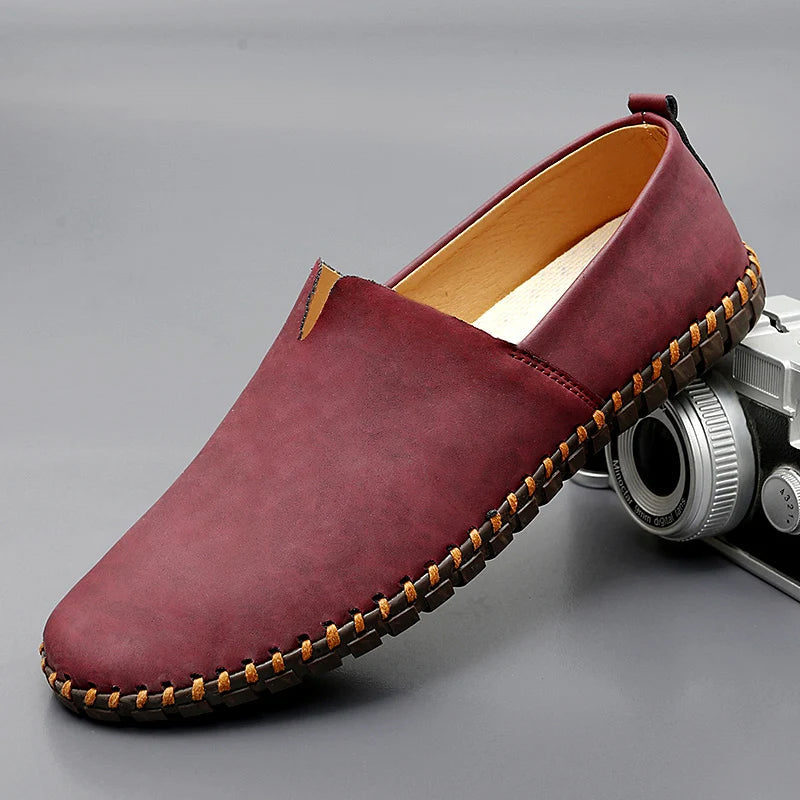 Round toe slip-on loafers with contrast stitched sole trim