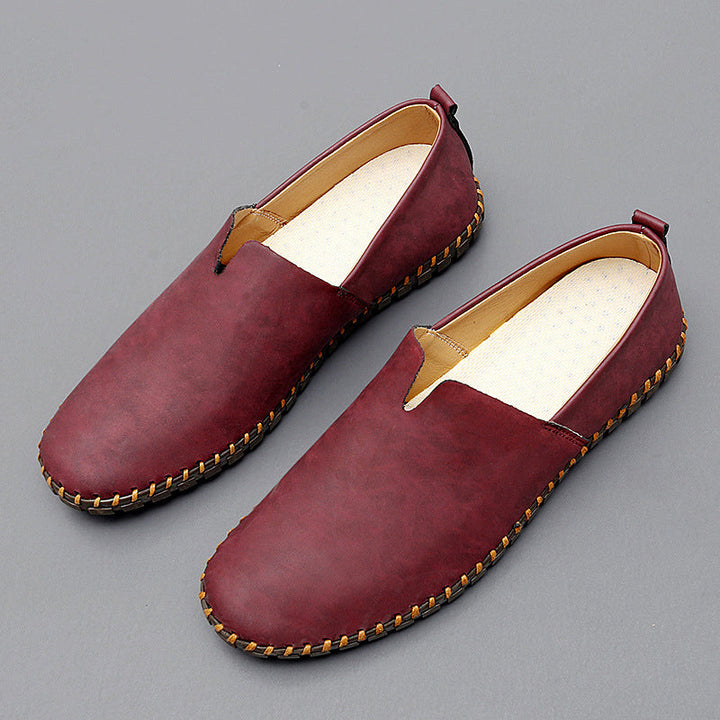 Round toe slip-on loafers with contrast stitched sole trim