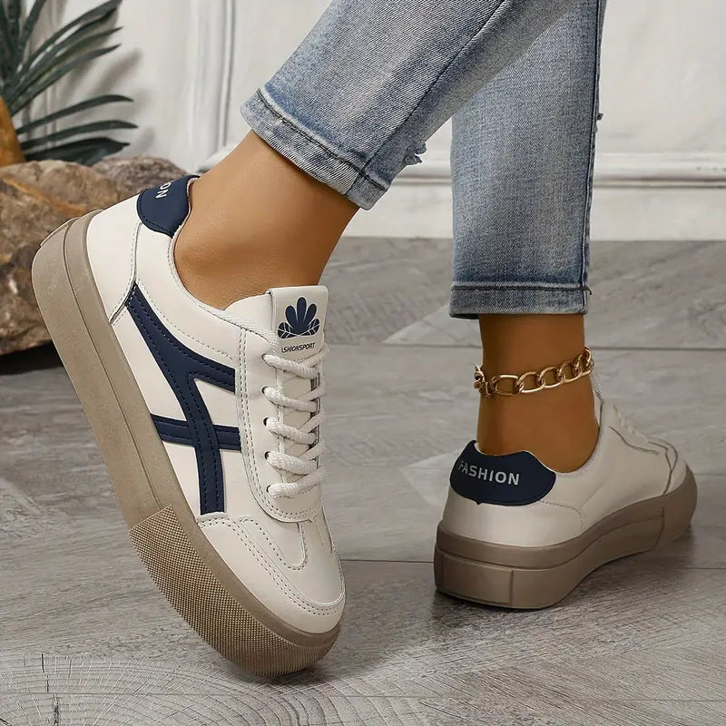 Low-top lace-up sneakers with contrasting side stripes and textured soles