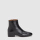 Women's black smooth ankle boot with round toe and low block heel